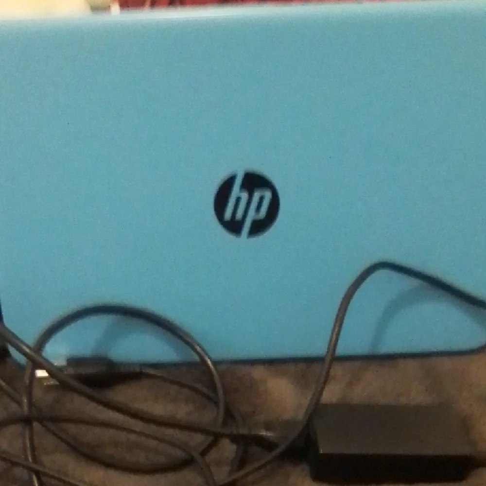 Blue Laptop with White Keyboard